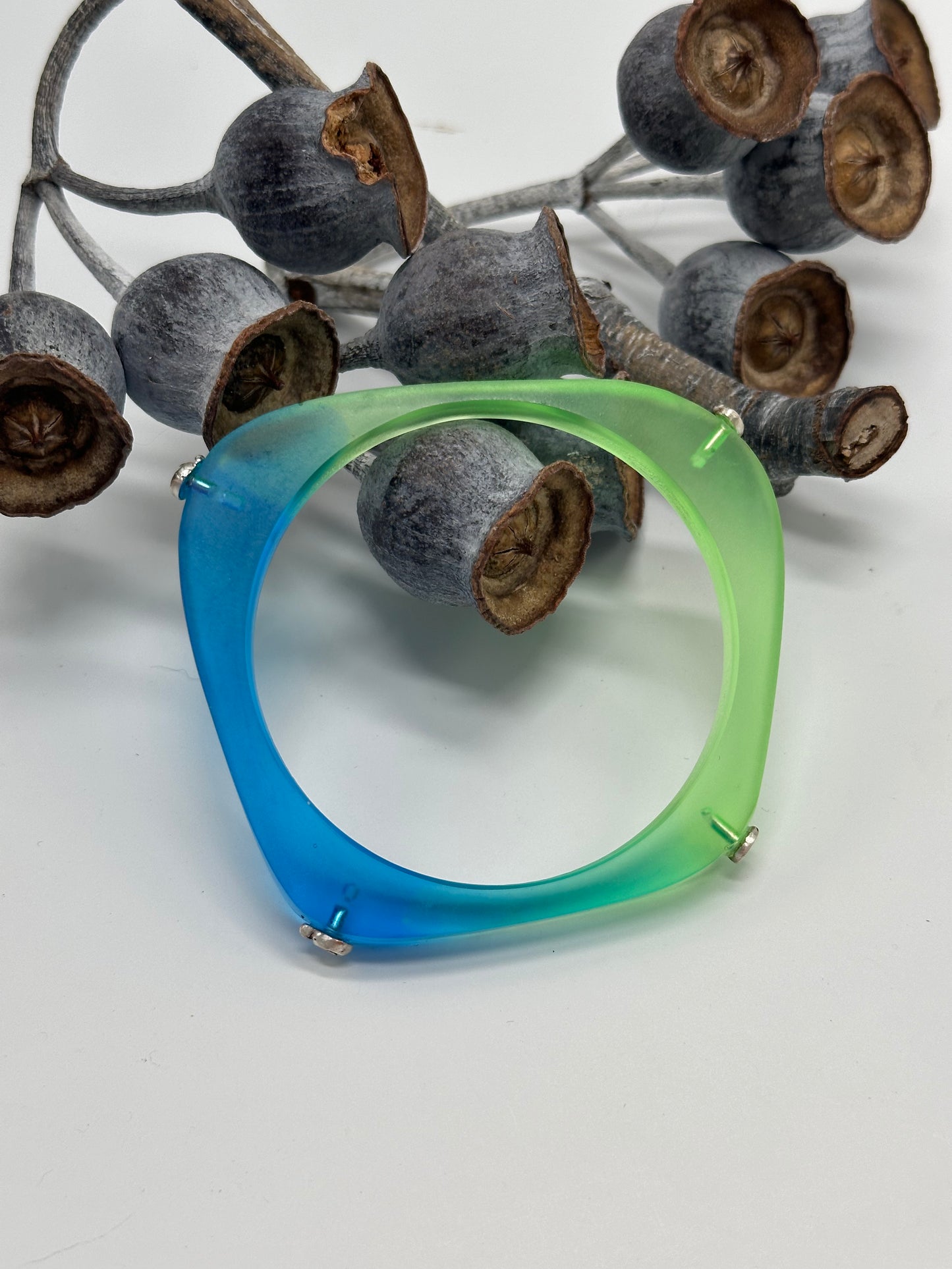Two toned 'square round' blue/green bangle with silver