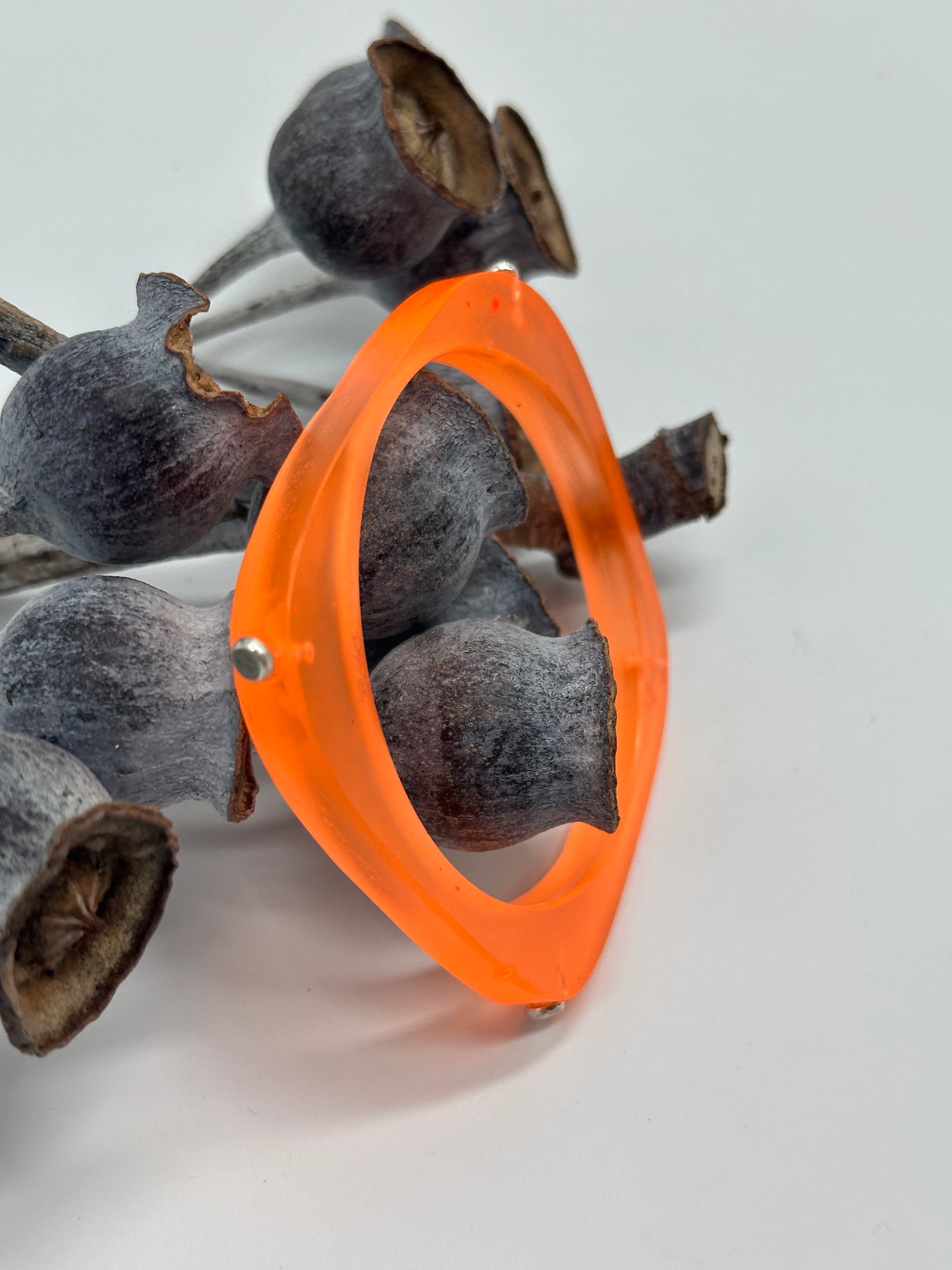 Neon orange 'square round' bangle with silver