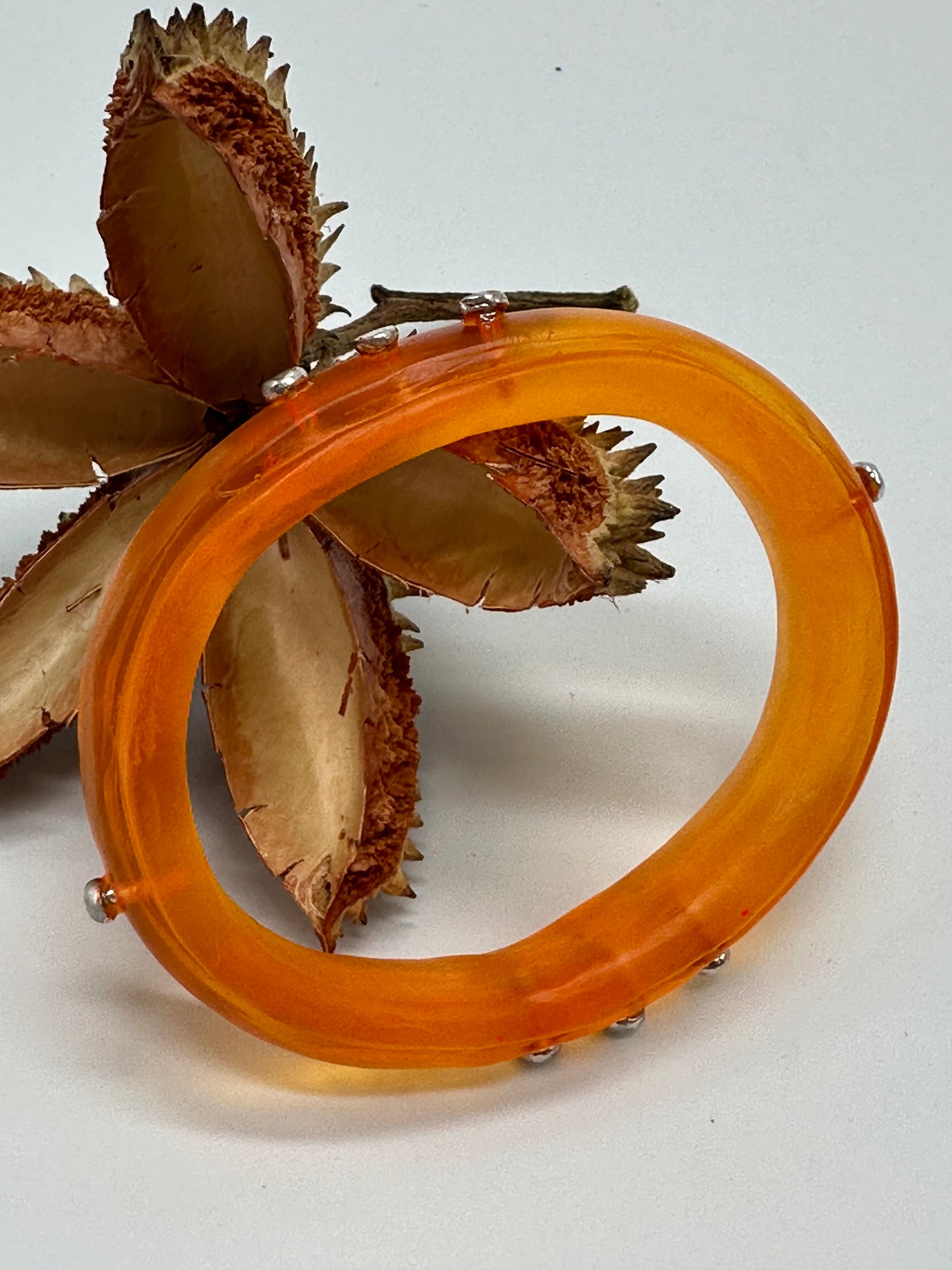 Pale Orange Rim resin bangle with Sterling silver