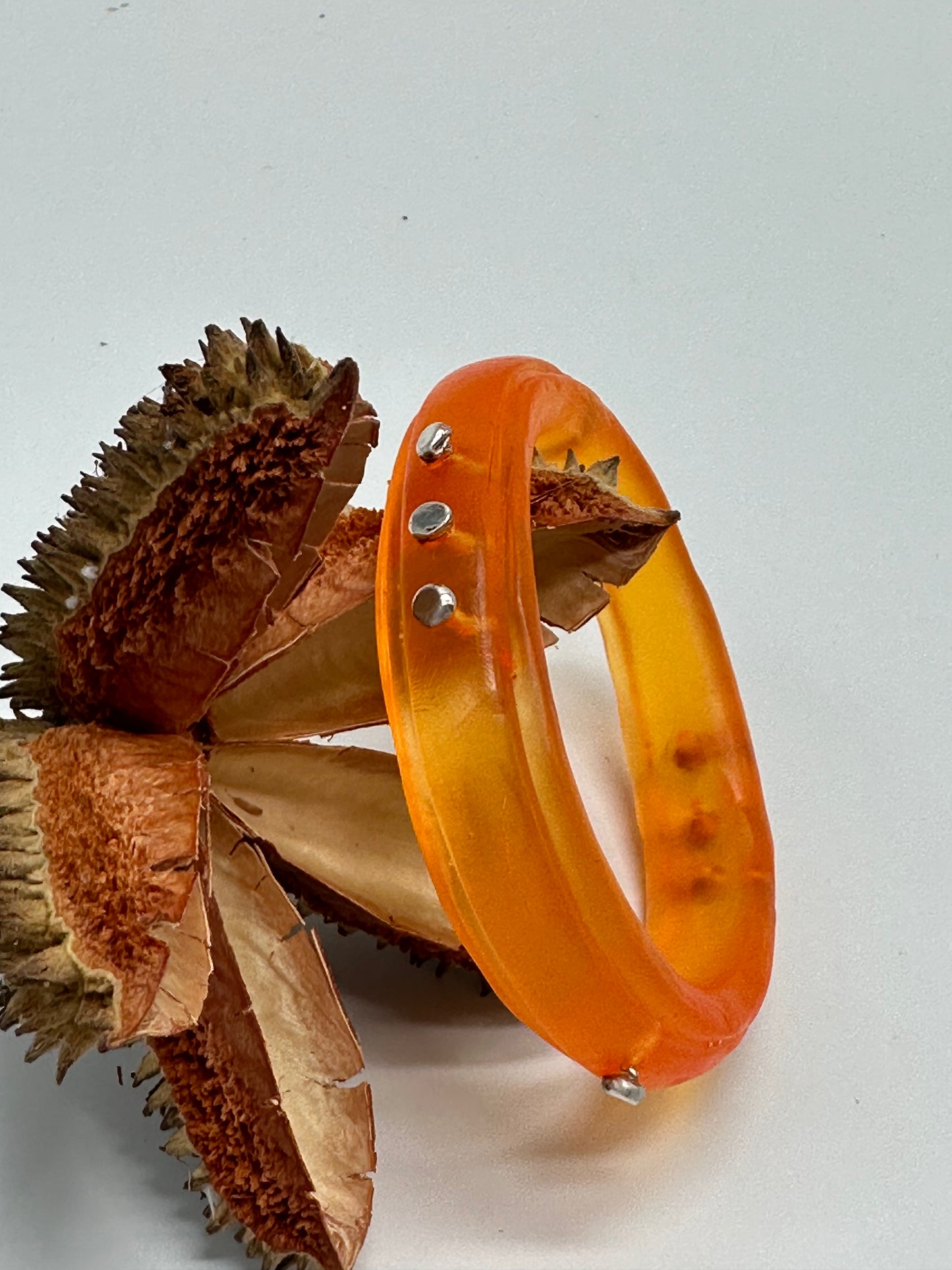 Pale Orange Rim resin bangle with Sterling silver