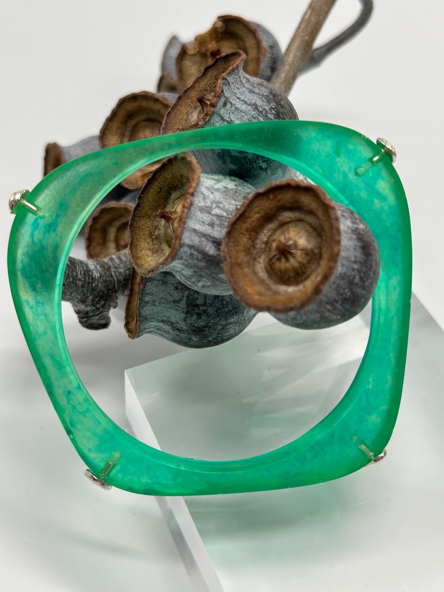 Translucent green 'square round' bangle with silver