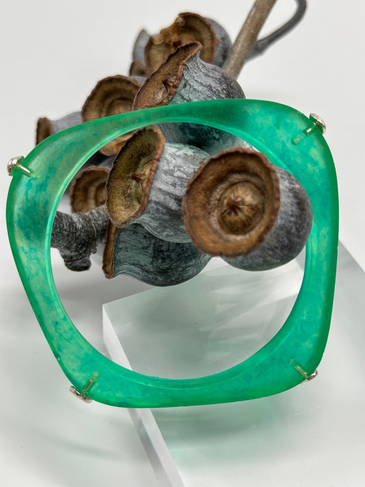 Translucent green 'square round' bangle with silver