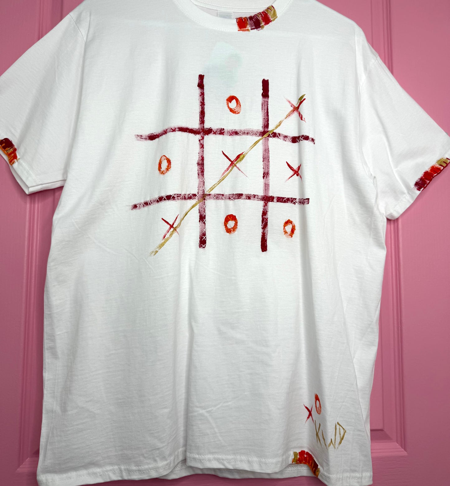 Naughts and crosses - red/orange t-shirt - size L