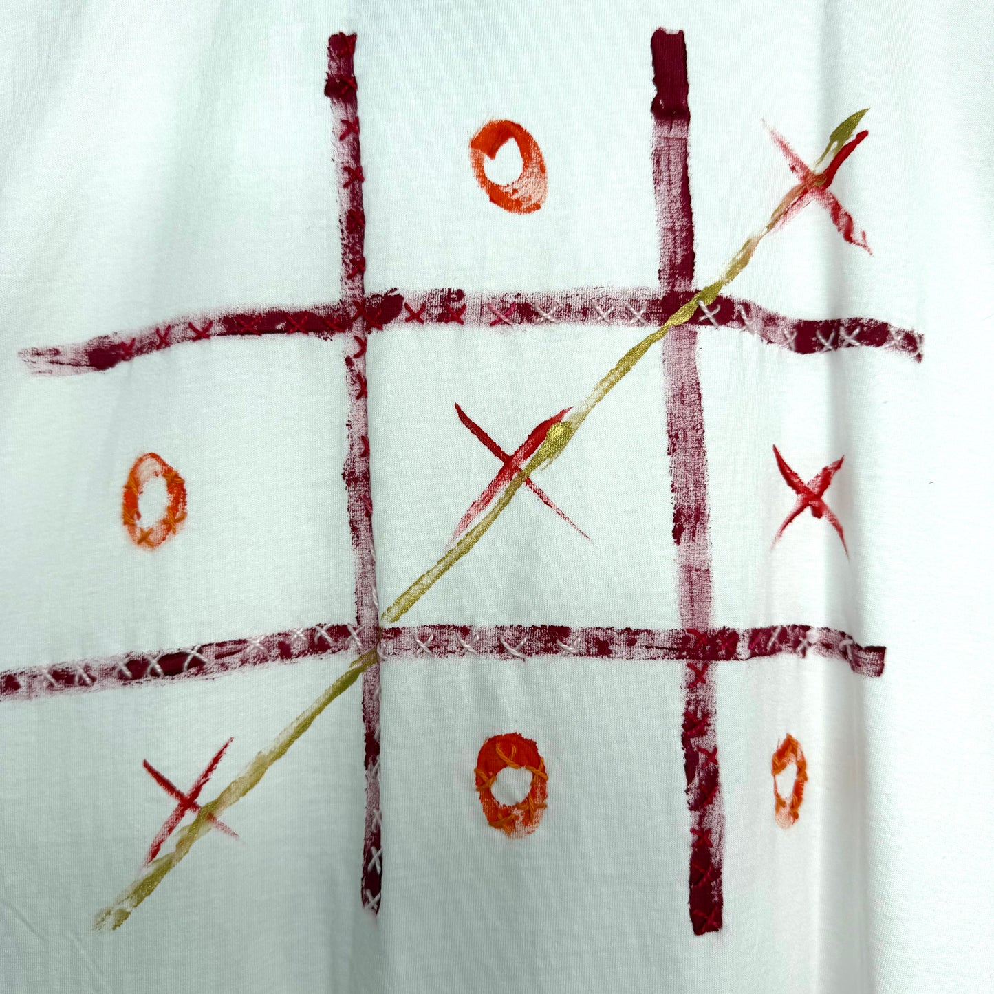 Naughts and crosses - red/orange t-shirt - size L