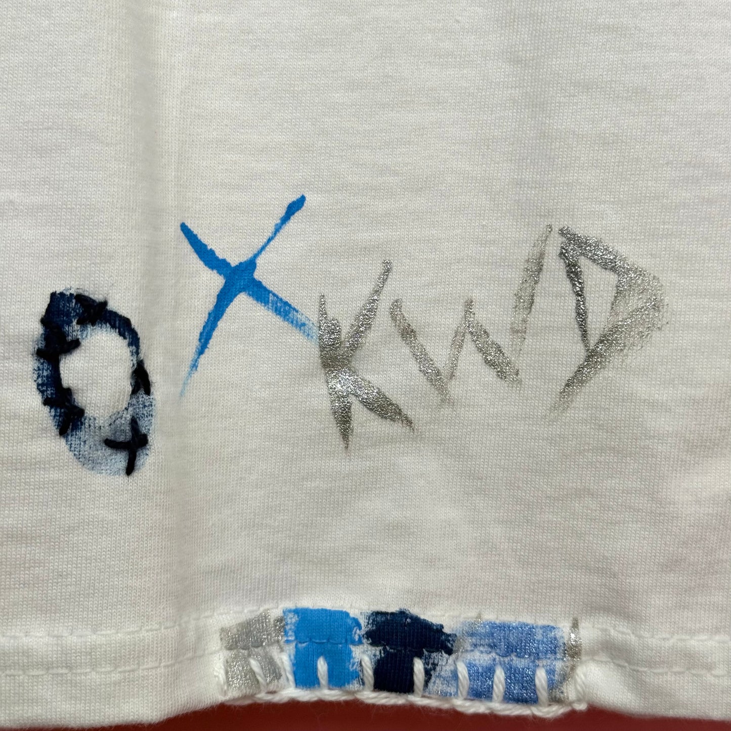 Naughts and crosses blues/silver t-shirt - size M