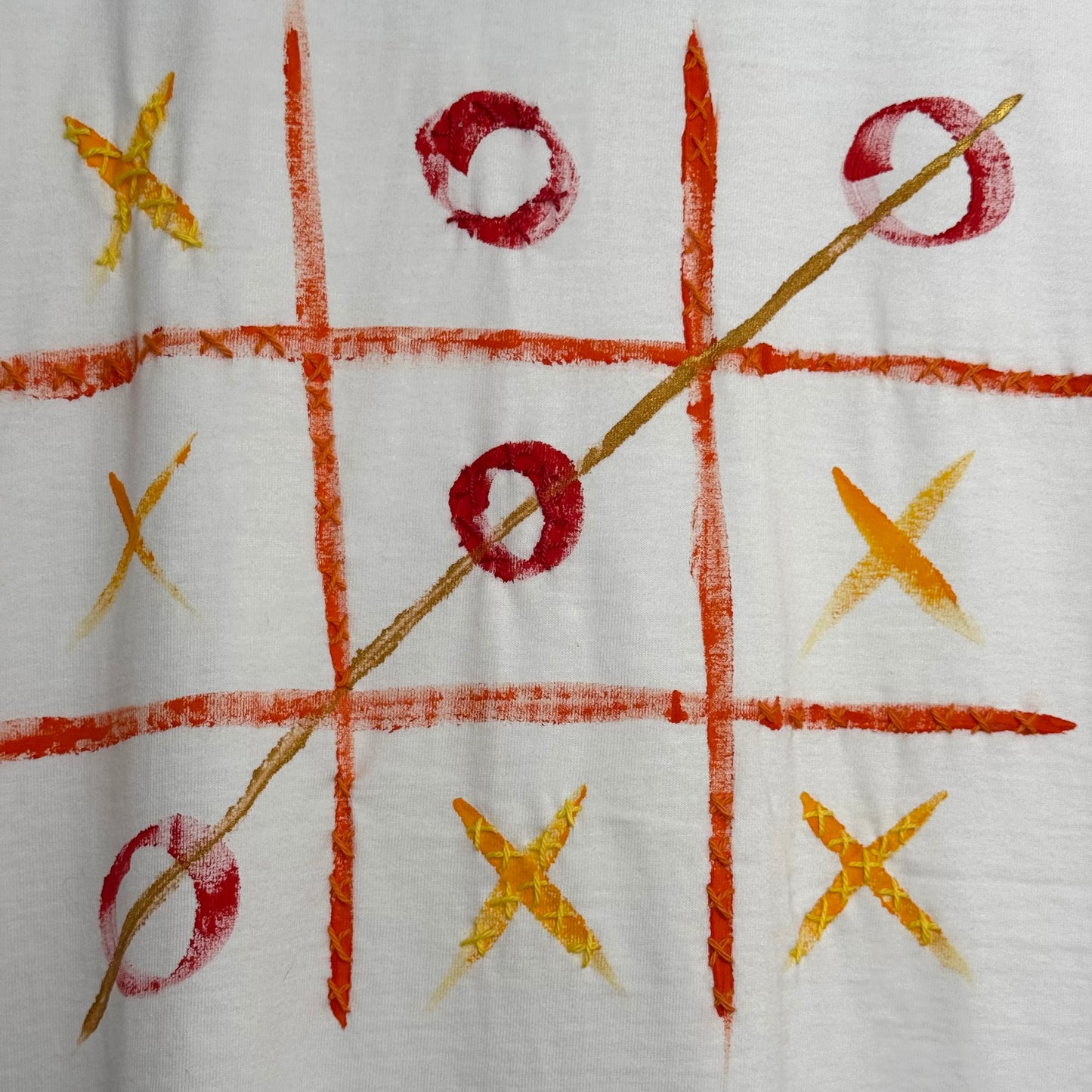 Naughts and crosses Red/orange/yellow t-shirt - size L