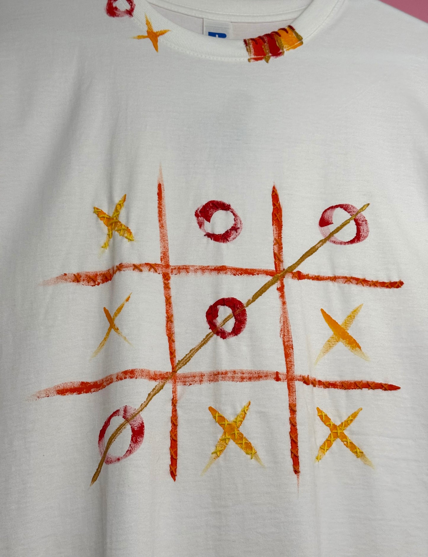 Naughts and crosses Red/orange/yellow t-shirt - size L