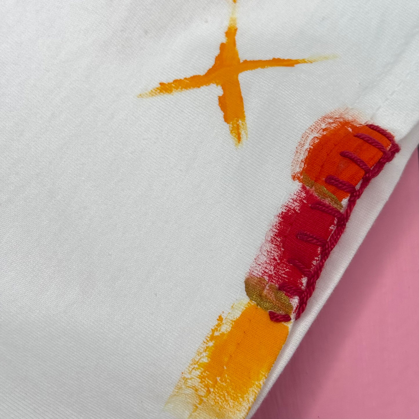 Red & Orange striped t-shirt - size M