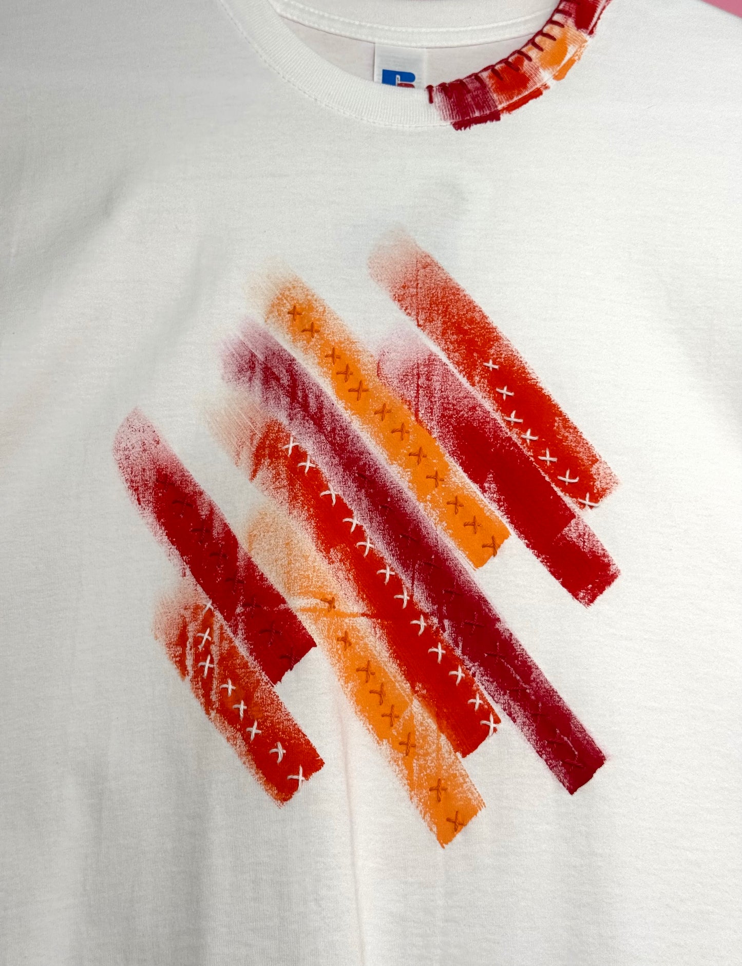 Red & Orange striped t-shirt - size M