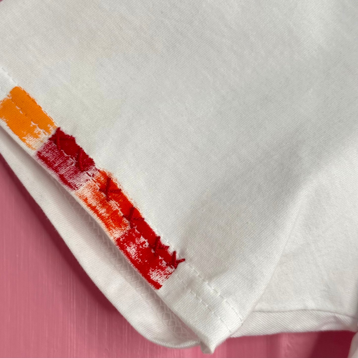 Red & Orange striped t-shirt - size M