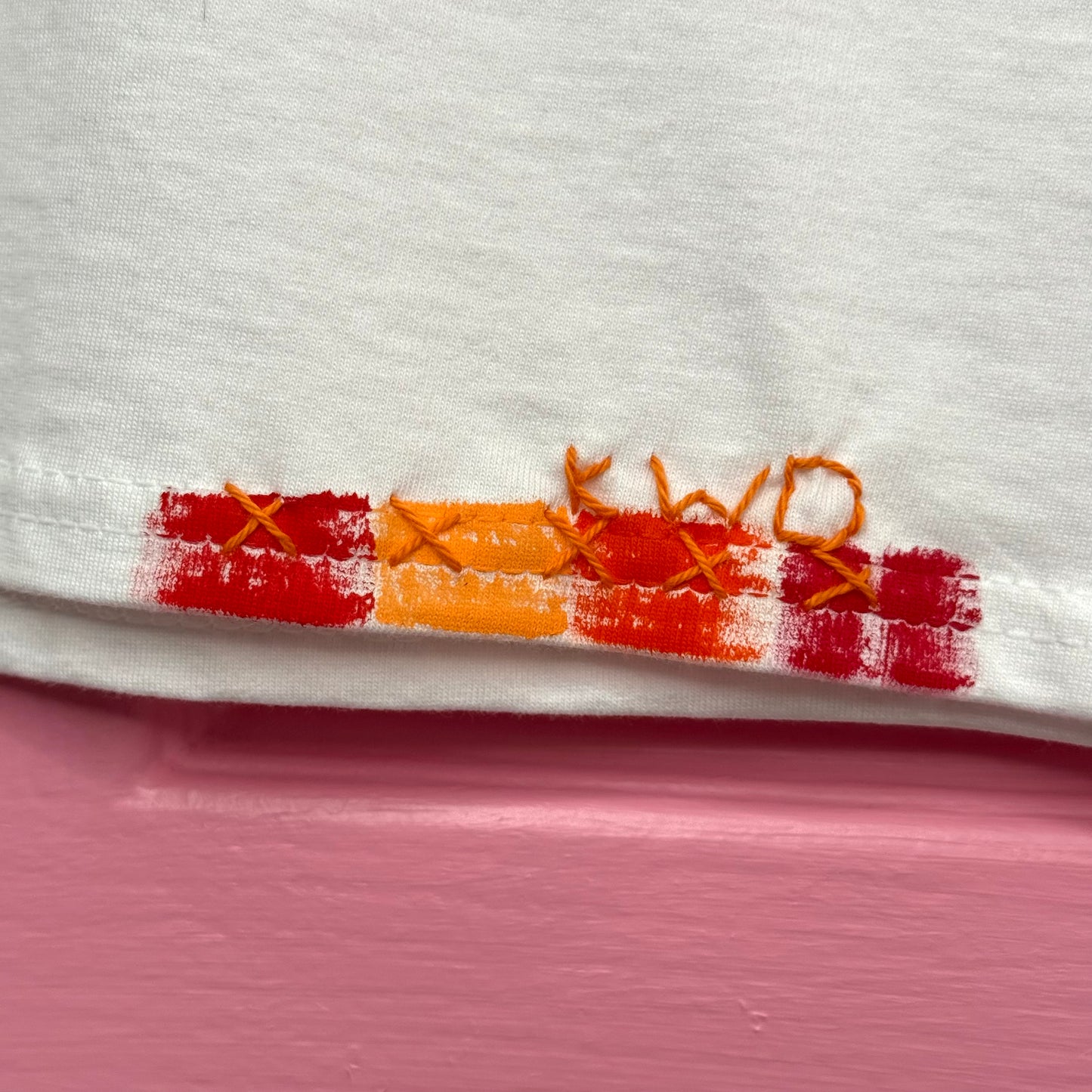 Red & Orange striped t-shirt - size M