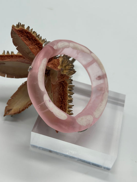 Pink & white resin & silver 'woopy' bangle
