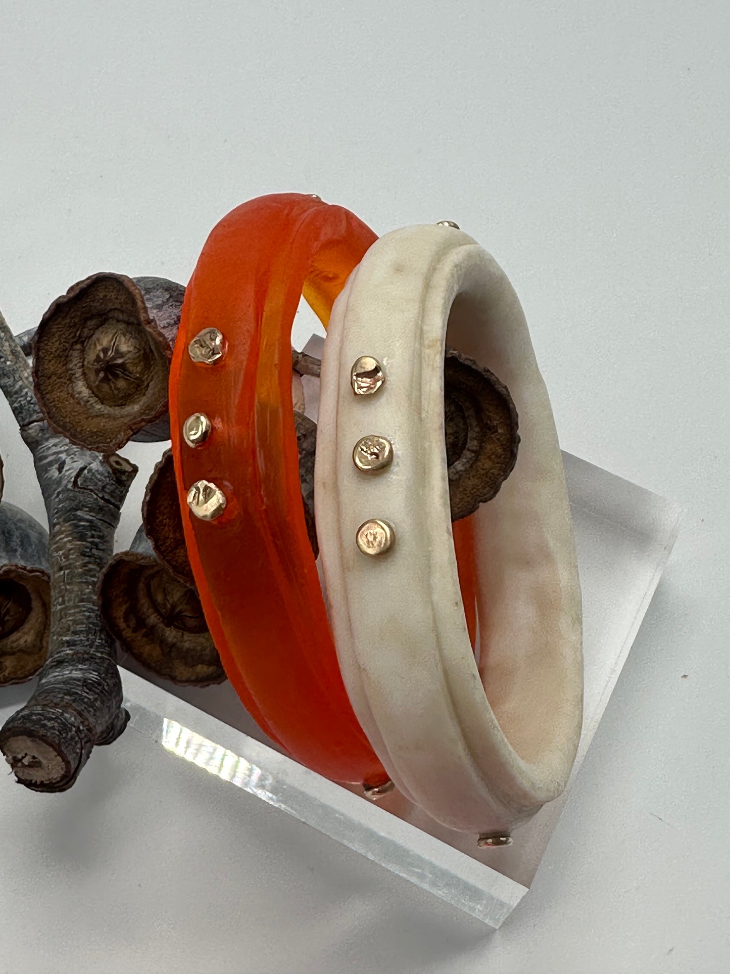 Orange rim bangle with gold nuggets