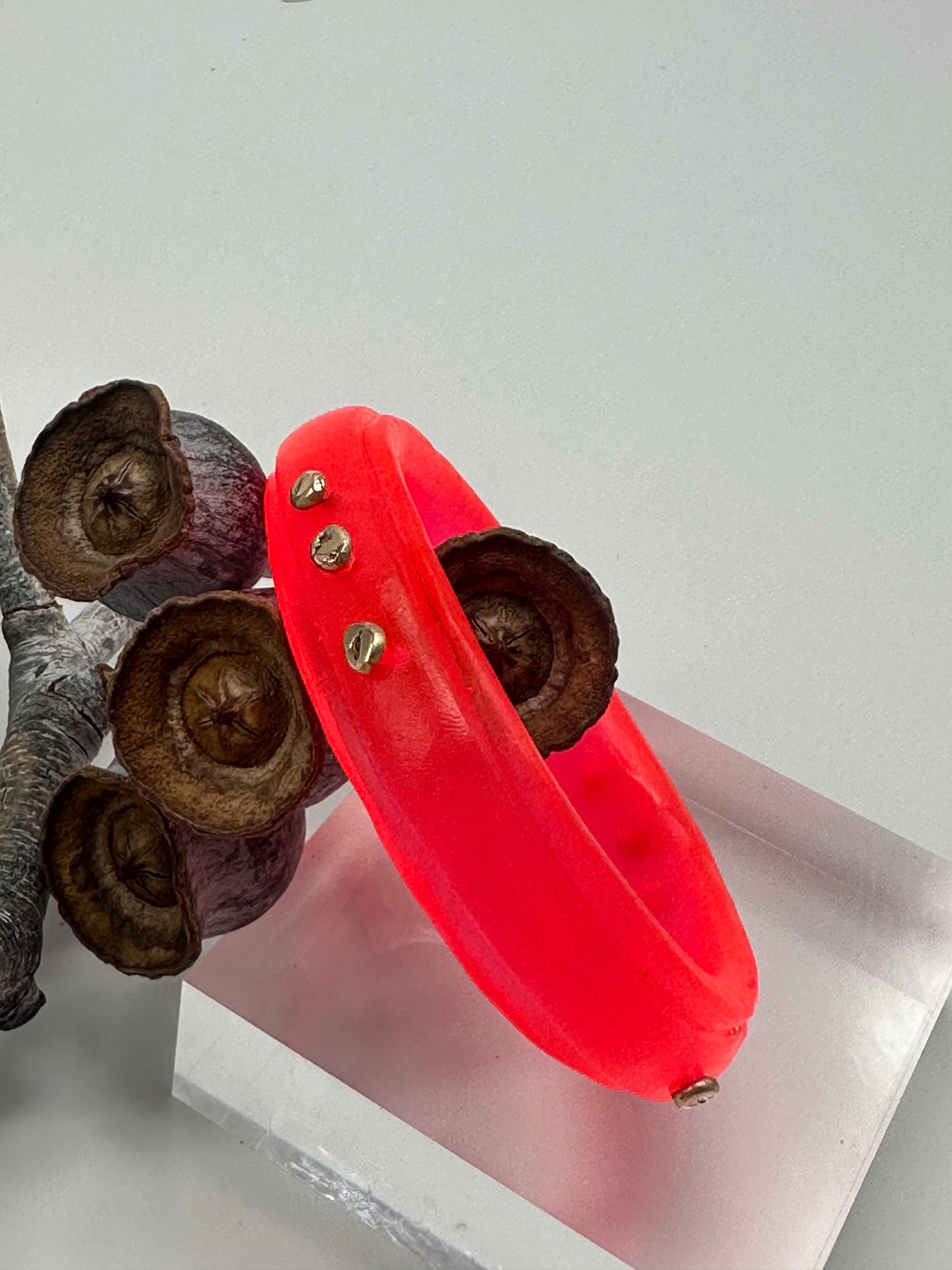 Neon Red rim bangle with gold nuggets