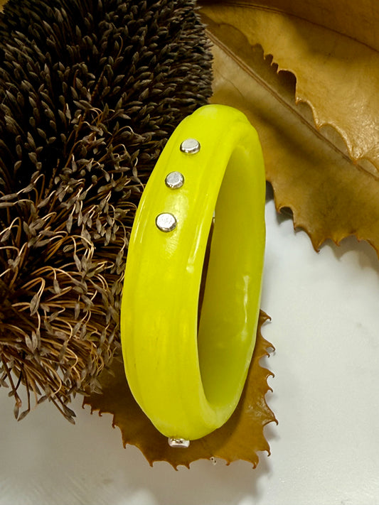 Bright Yellow resin rim bangle with sterling silver rivets