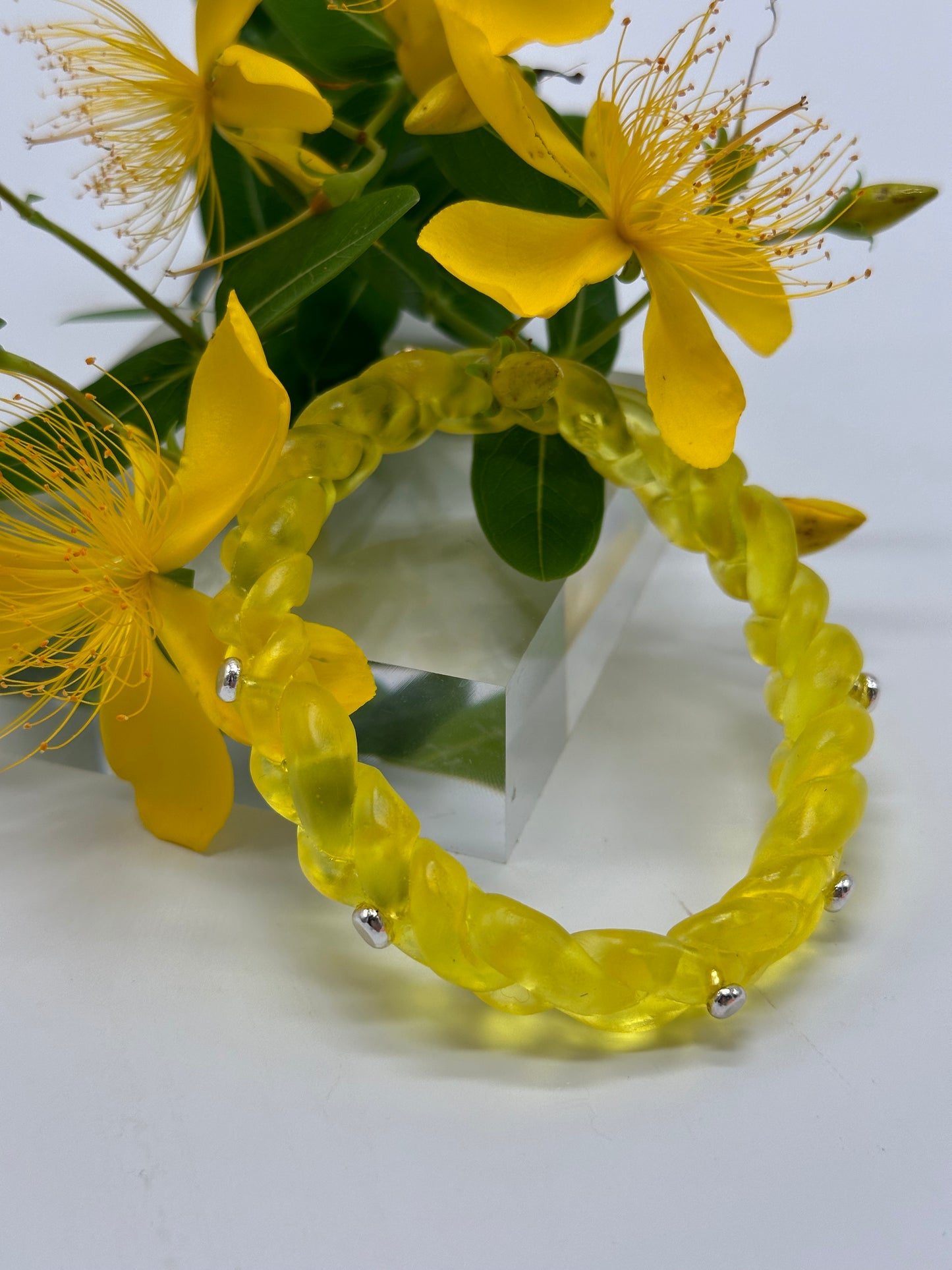 Yellow resin and sterling silver rivet plaited classic bangle