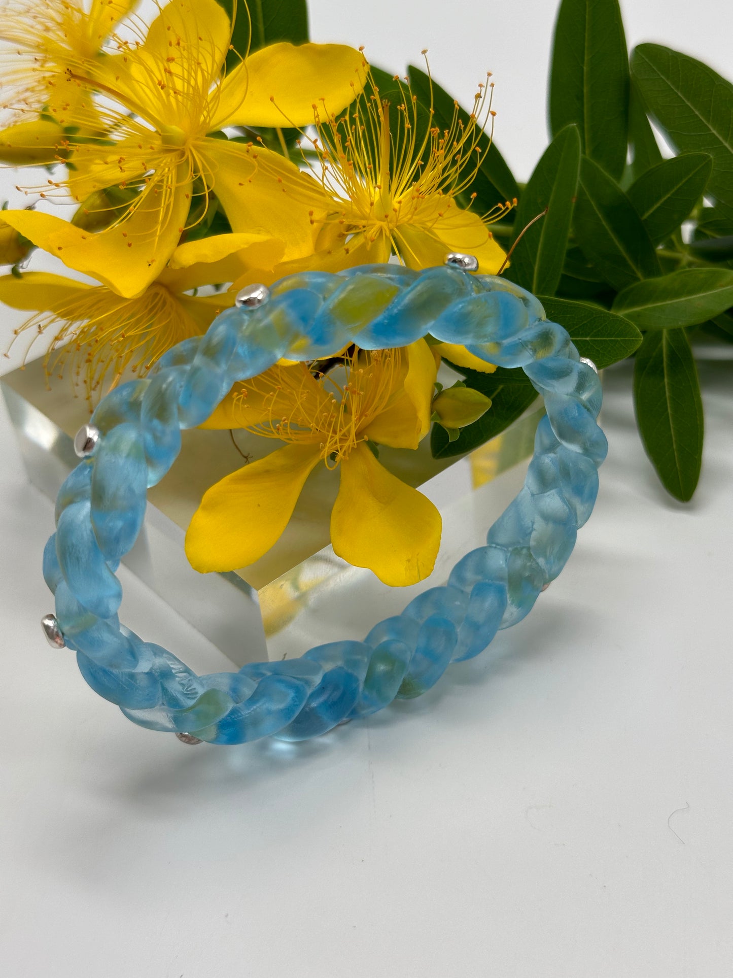Pale Translucent Blue resin and sterling silver rivet plaited classic bangle