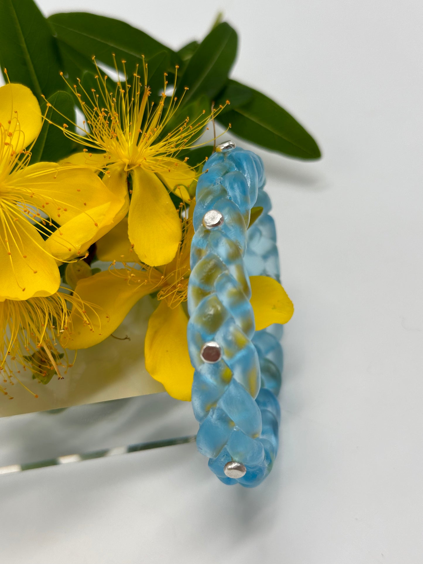 Pale Translucent Blue resin and sterling silver rivet plaited classic bangle