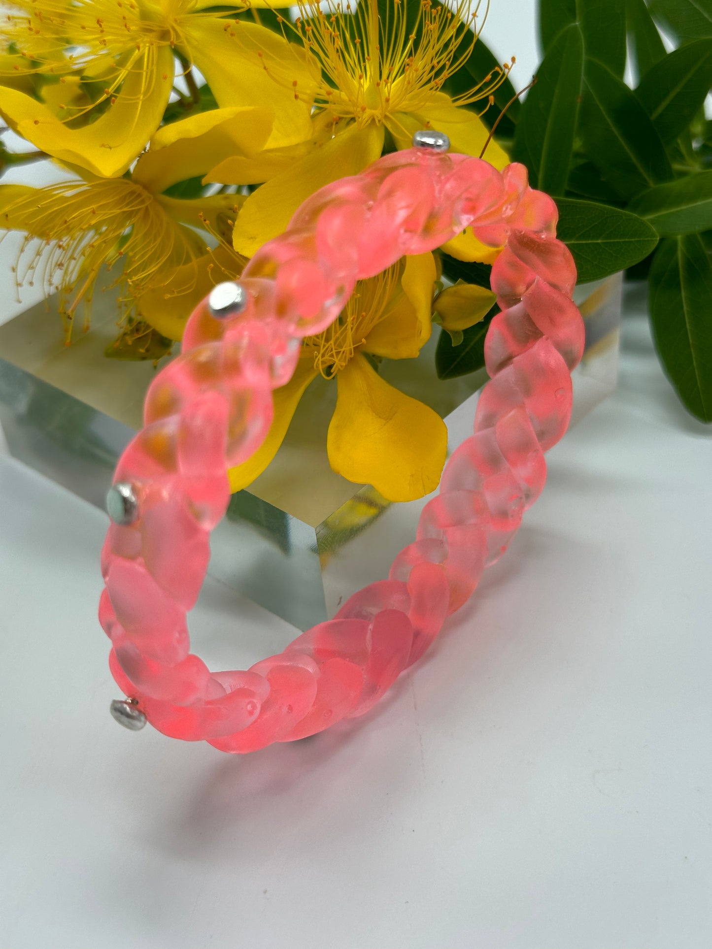 Neon Translucent Coral resin and sterling silver rivet plaited classic bangle