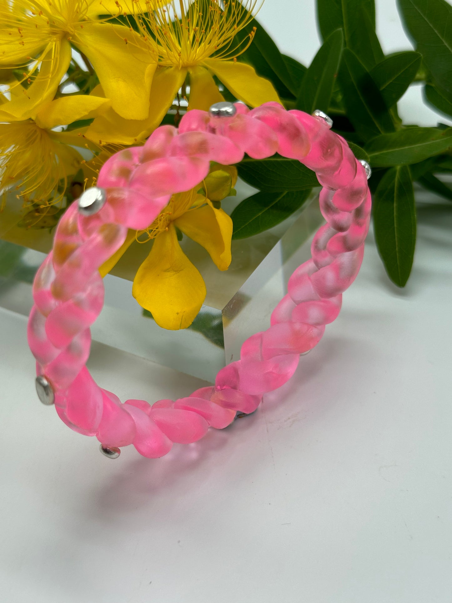Neon Translucent Pink resin and sterling silver rivet plaited classic bangle