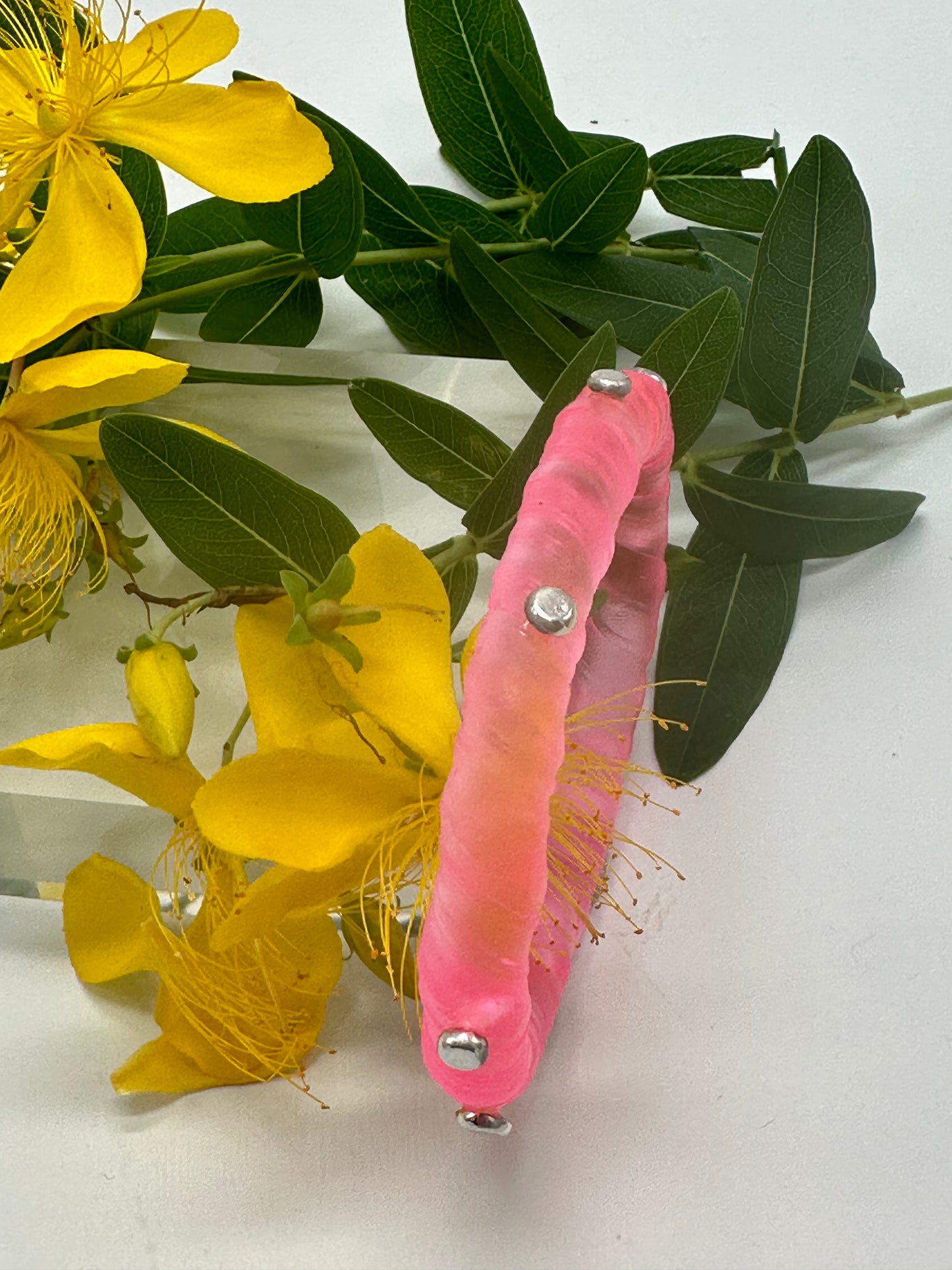 Neon Translucent Pink resin and sterling silver rivet 'simple twist' classic bangle