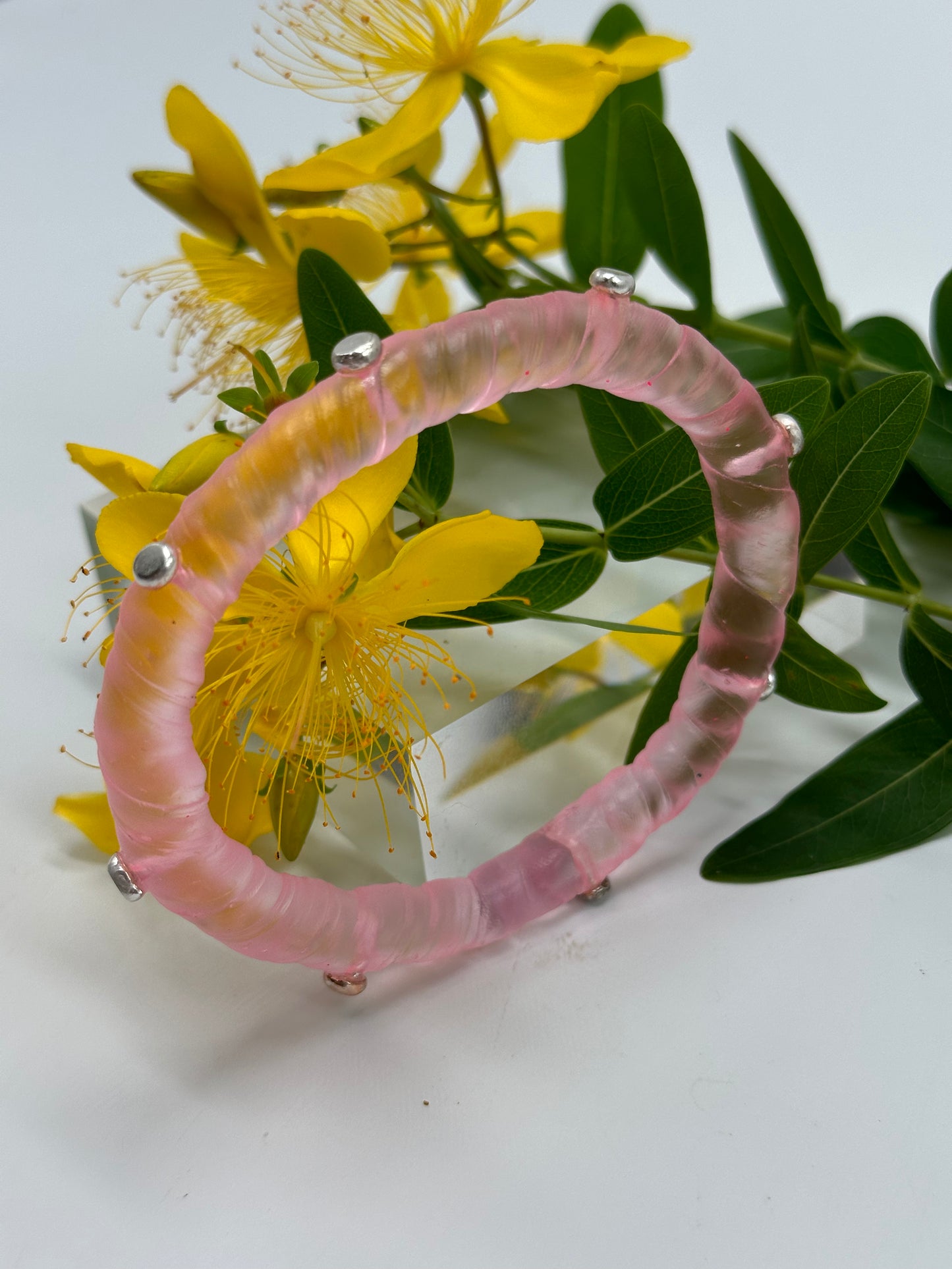Pale Translucent Pink resin and sterling silver rivet 'simple twist' classic bangle