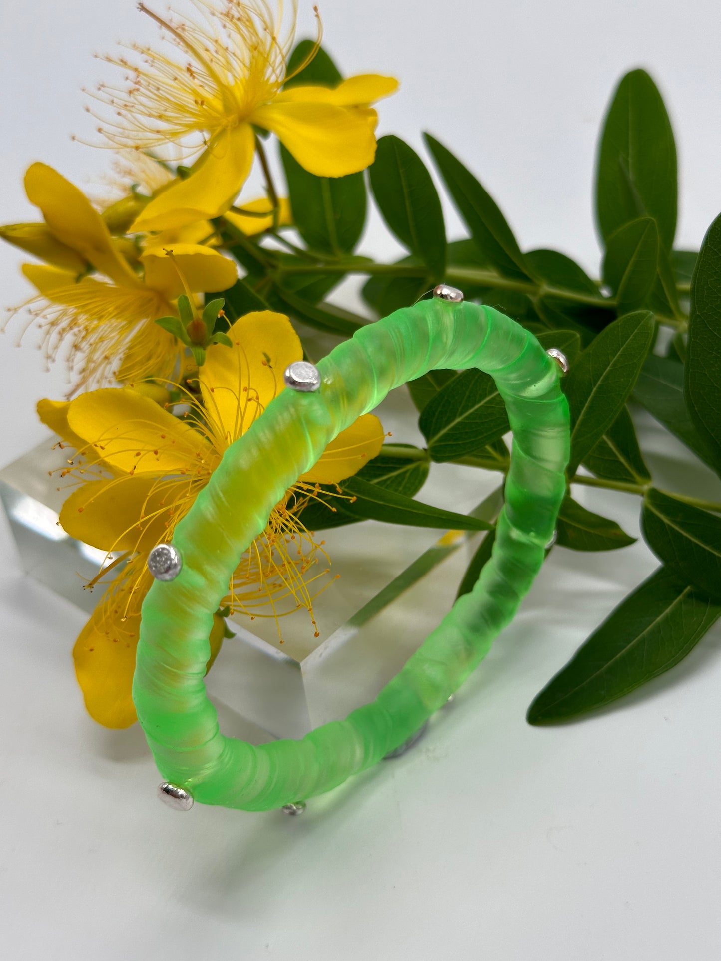 Translucent Neon Green resin and sterling silver rivet 'simple twist' classic bangle