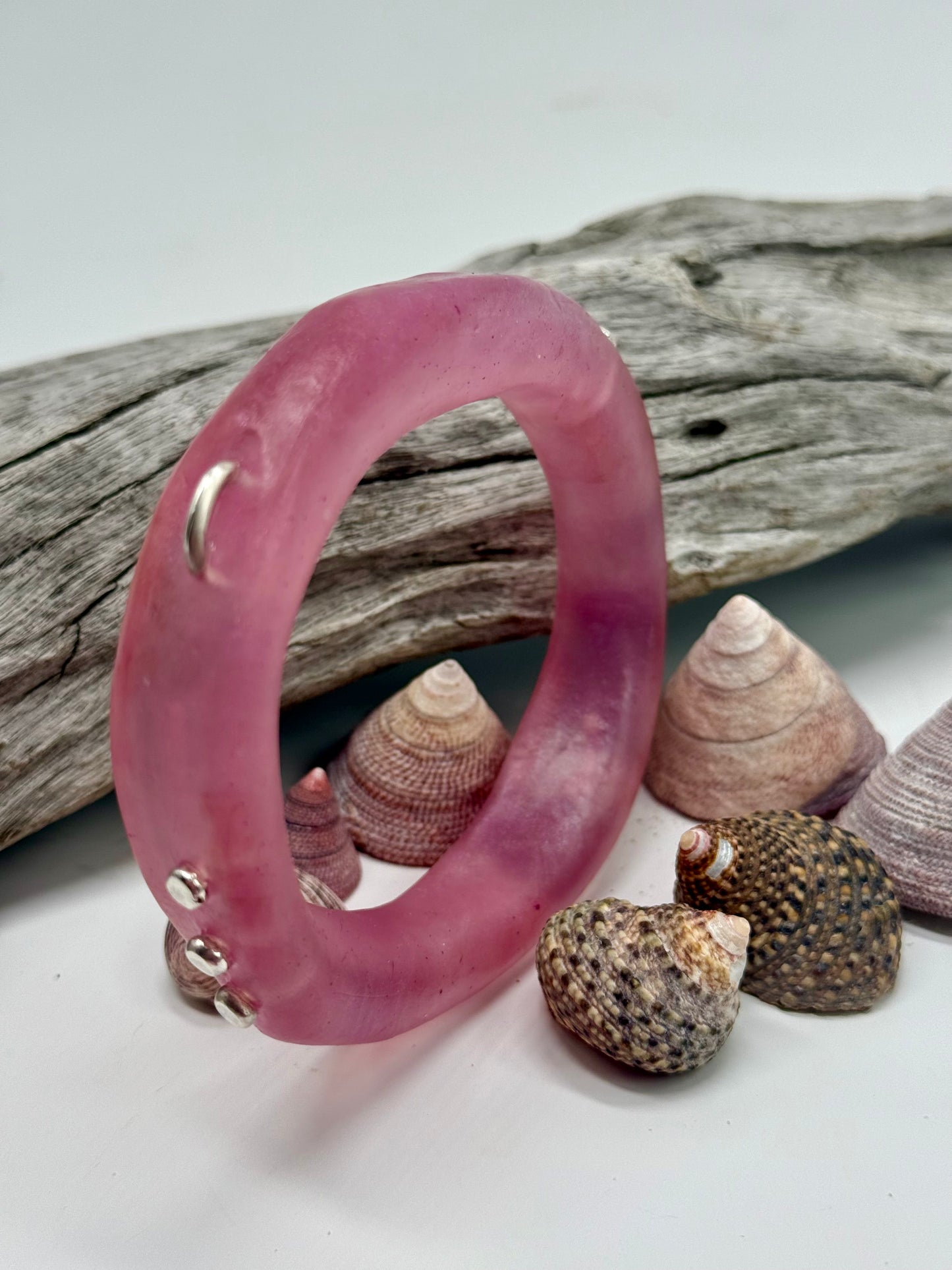 Pink resin and silver 'woopy' bangle - regular size