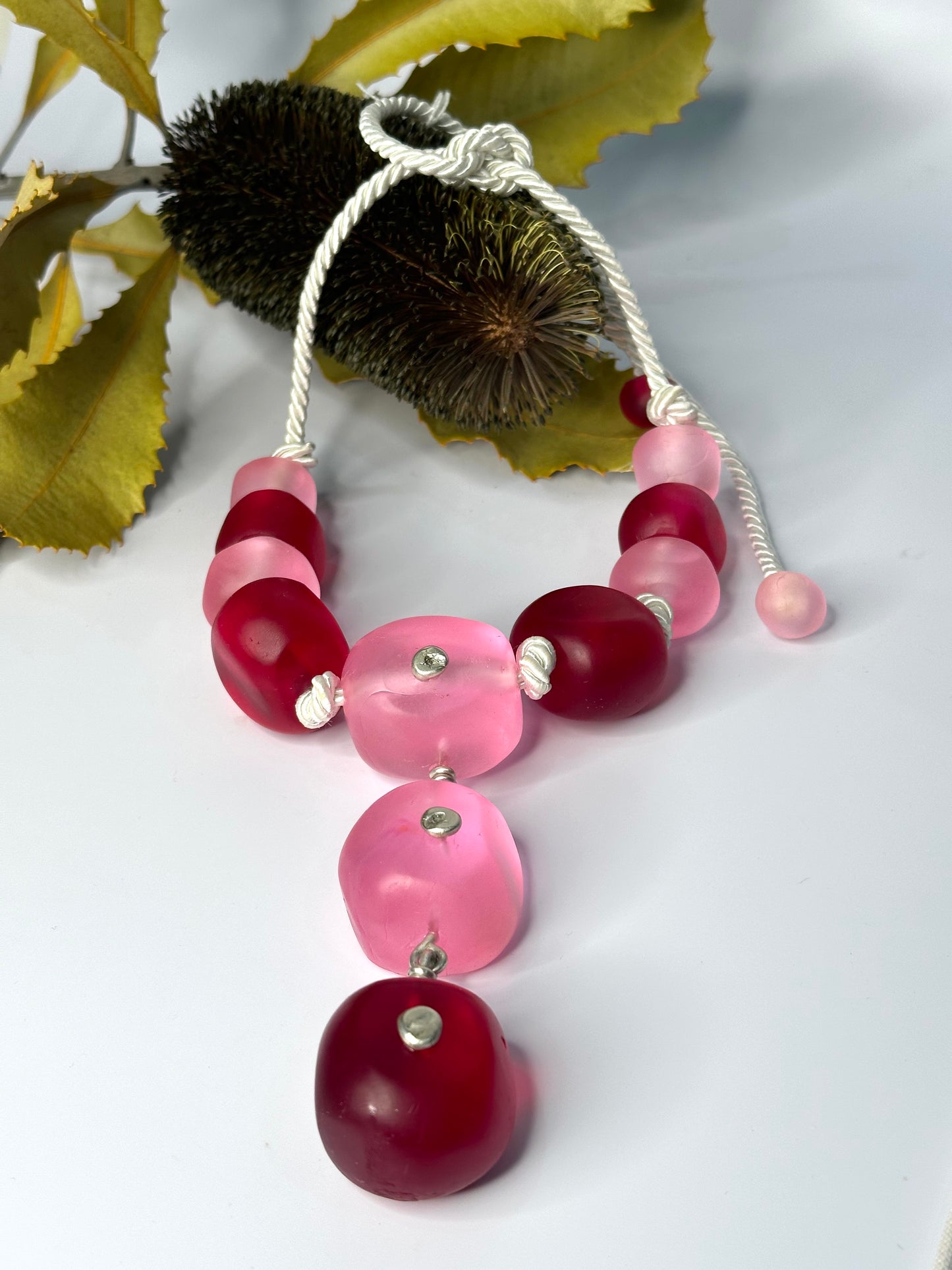Pale Pink/Red Resin hanging Pendant & silver necklace