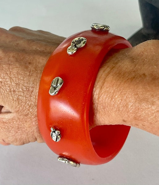 Orange Resin bangle with silver nuggets